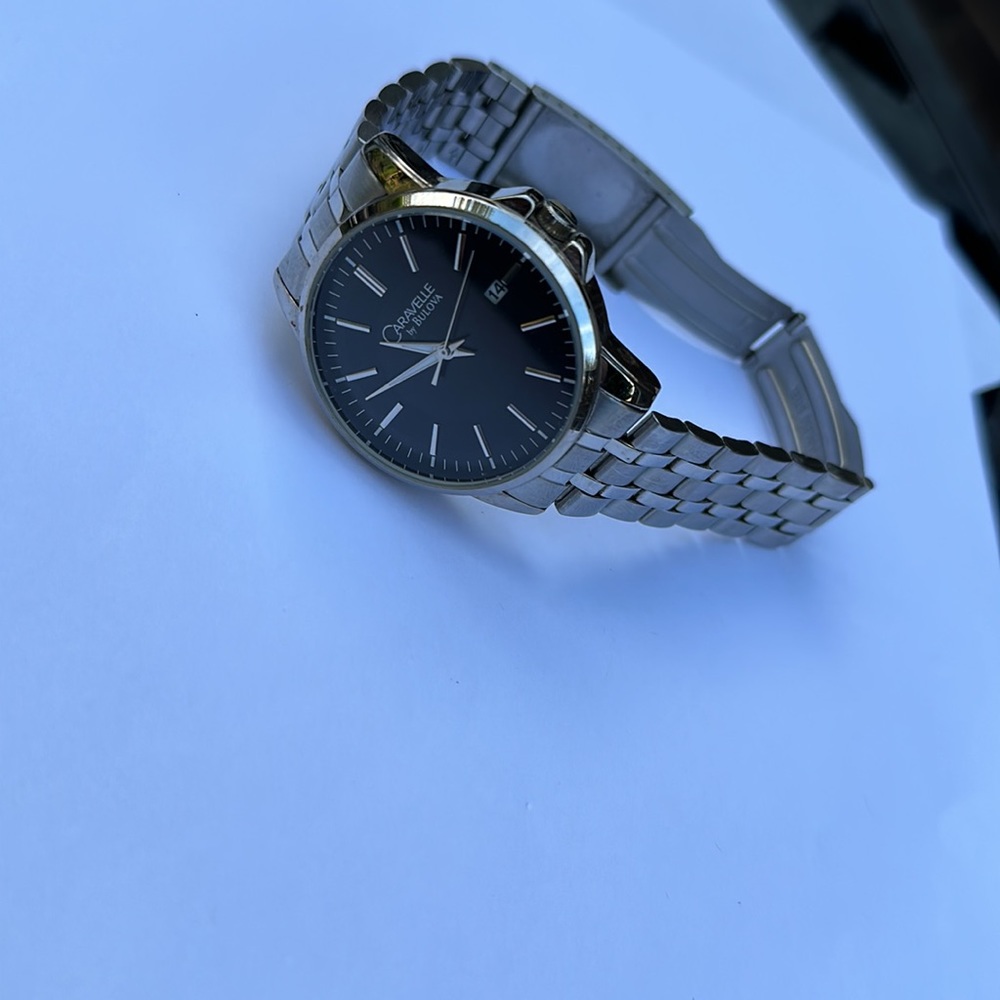 Elegant Silver Watch with Black Face